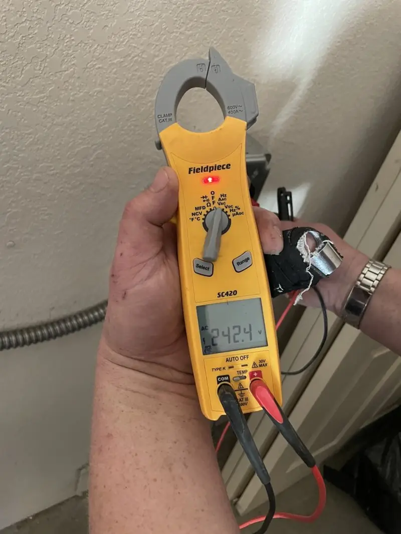 Voltage testing with clamp meter during Whole House Surge Protector in Tabor City